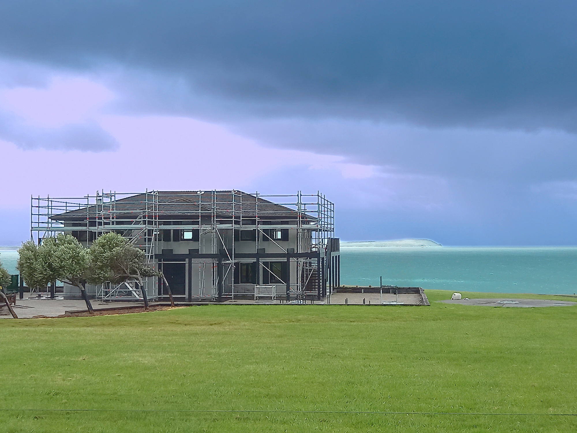 Scaffolding with access tower erected by Victorian scaffolding and formwork services business, Scaffdex. The structure is a newly built house within the Bass Coast area of Victoria.